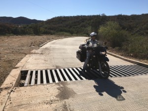 Crossing it, can't really see it too well here but the distance between the metal is wider than my tires. 